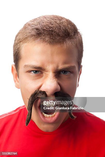 young italian boy roaring with big black mustaches - big moustache stock pictures, royalty-free photos & images