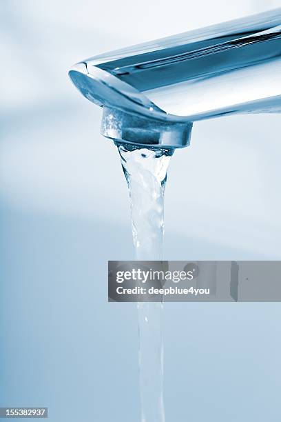 running water from bathroom faucet - running water isolated stock pictures, royalty-free photos & images