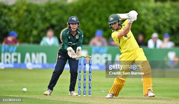 Dublin , Ireland - 25 July 2023; Ashleigh Gardner of Australia bats watched by Ireland wicketkeeper Amy Hunter during match two of the Certa Women's...