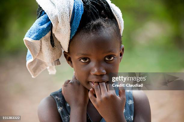 cute little girl after washing hair - uganda stock pictures, royalty-free photos & images