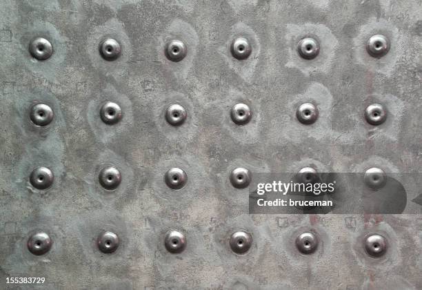 heavy metal hintergrund - nieten stock-fotos und bilder
