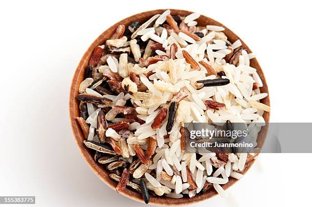 bowl of mixed rice on white background - wild rice stock pictures, royalty-free photos & images