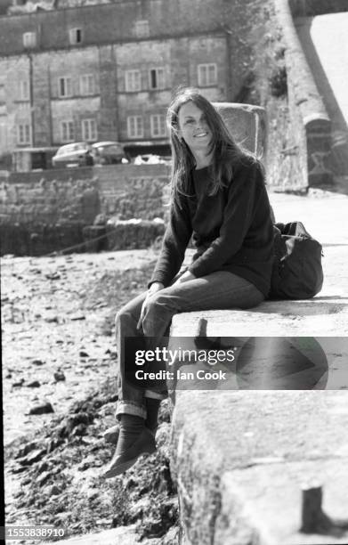 Model Jean Shrimpton poses for a portrait in 1982 in Cornwall, UK.