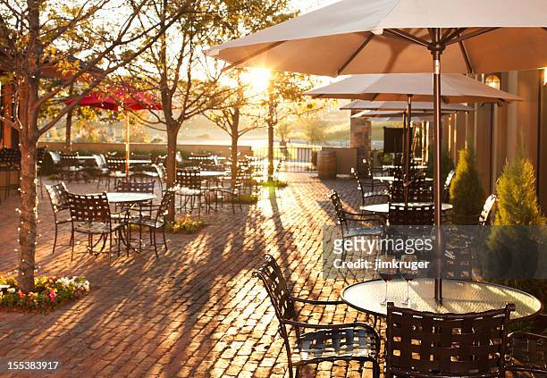 lovely summer patio setting in restaurant. - restaurant patio bildbanksfoton och bilder