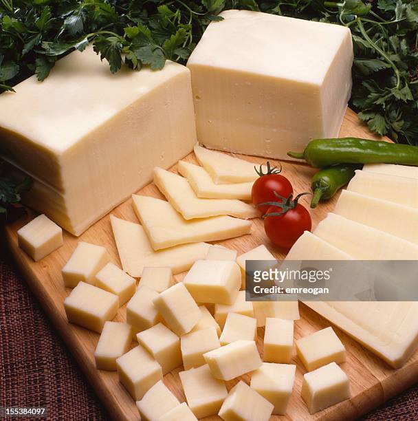 cheese on a wood - cheese cubes stock pictures, royalty-free photos & images