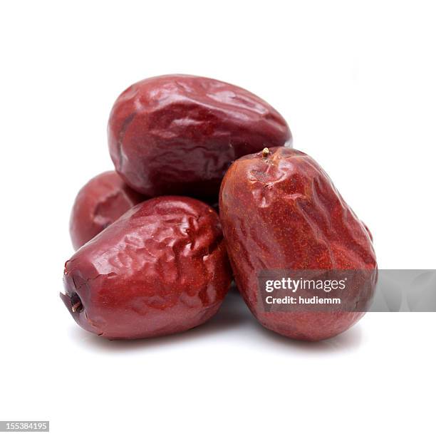 dry red jujubes isolated on white background - date fruit stock pictures, royalty-free photos & images