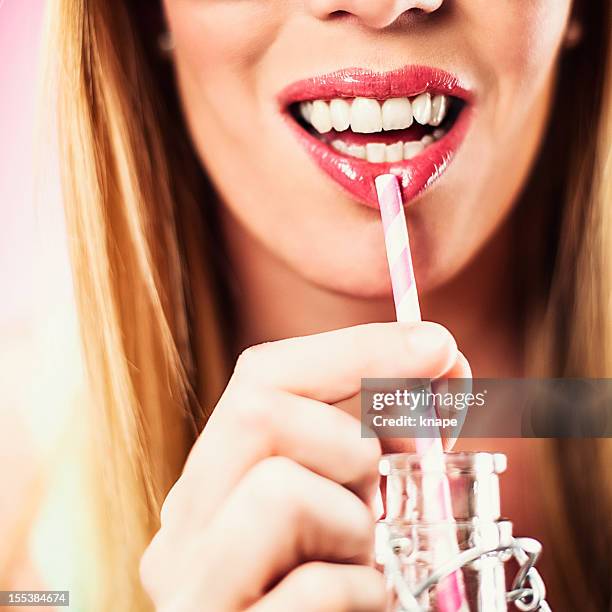 hot lips drinking out of straw - straw lips stock pictures, royalty-free photos & images