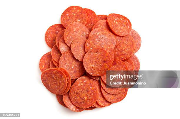 heap of pepperoni - pepperoni stock pictures, royalty-free photos & images