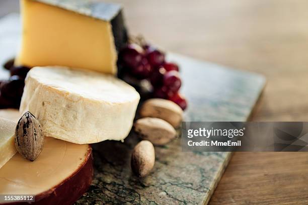 various cheeses - rauwe melk stockfoto's en -beelden
