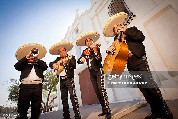 mariachi band - cinco de mayo stock-fotos und bilder