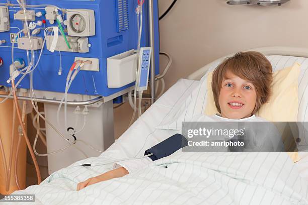 boy in hospital bed - dialysis stock pictures, royalty-free photos & images