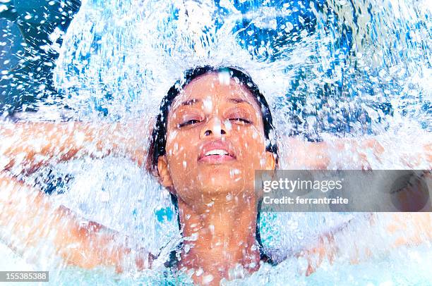 spa hydrotherapy - african ethnicity spa stock pictures, royalty-free photos & images