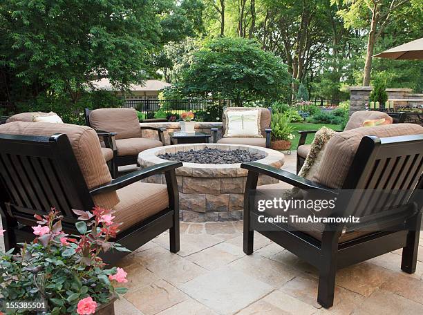 patio fire pit - fire pit stock pictures, royalty-free photos & images