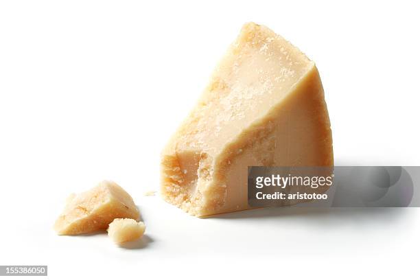 isolated piece of parmesan - parmesan cheese stock pictures, royalty-free photos & images