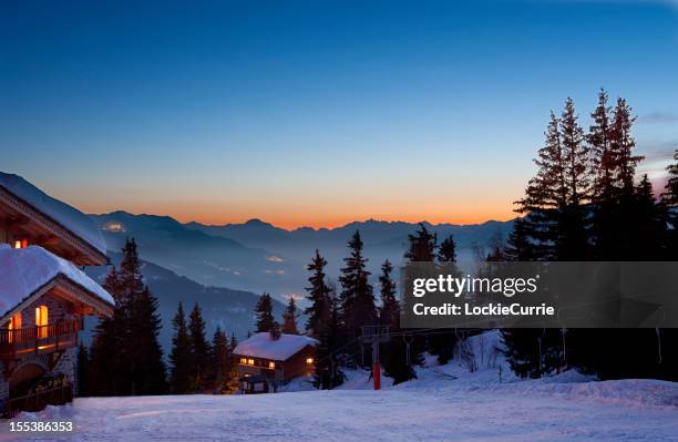 ski resort - house with christmas lights stock pictures, royalty-free photos & images