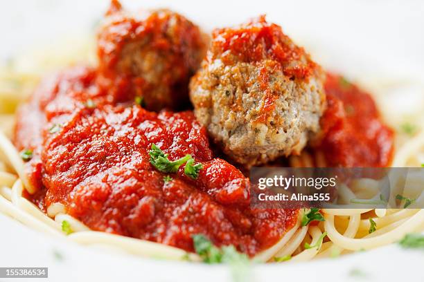 italian food: plate of spaghetti with meatballs - marinara stock pictures, royalty-free photos & images