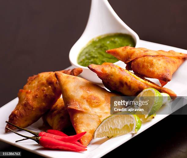 Samosa Photos and Premium High Res Pictures - Getty Images