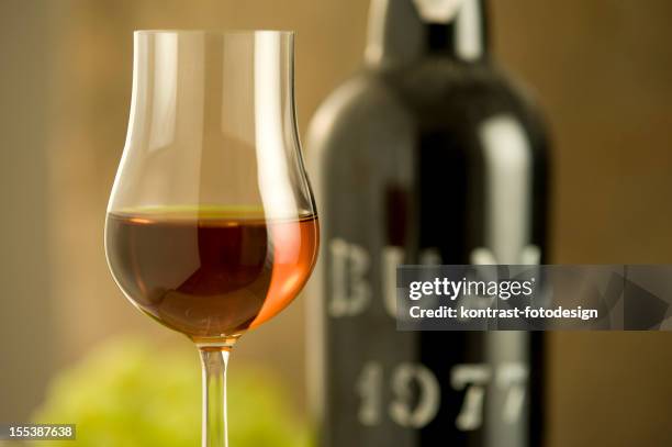 glass of madeira wine from 1977 - port bildbanksfoton och bilder