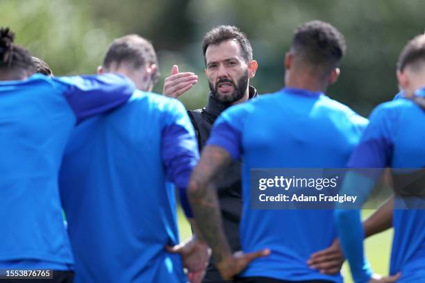 Carlos Corberan Head Coach / Manager of West Bromwich Albion speaks to players during a training session at West Bromwich Albion Training Ground on...