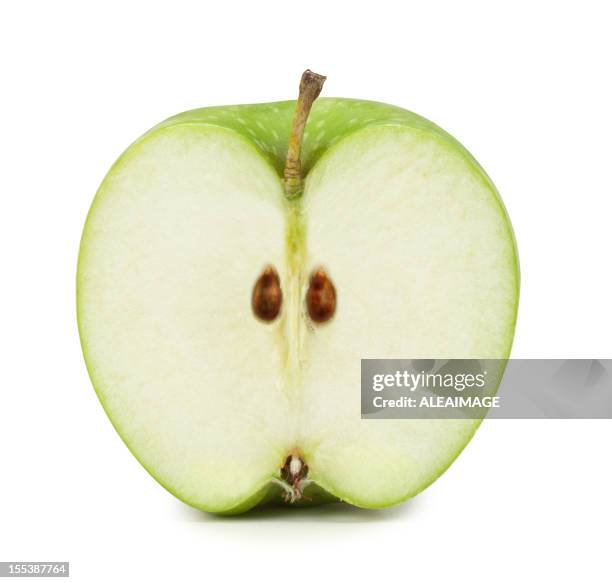 green apple cross section. clipping path included - apple bildbanksfoton och bilder