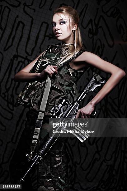 beautiful woman soldier - airsoft stock pictures, royalty-free photos & images