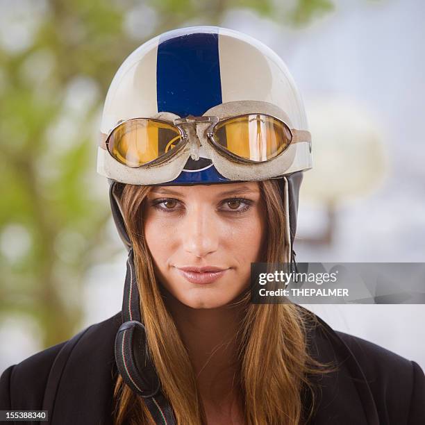 female motorcyclist with vintage helmet - vintage motorcycle helmet stock pictures, royalty-free photos & images