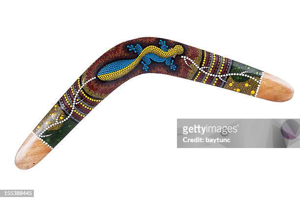 wooden boomerang pattern decorated with lizards - boomerang stock pictures, royalty-free photos & images