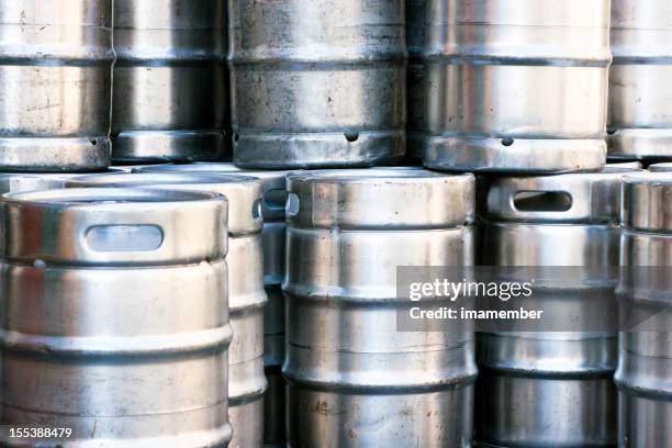 closeup heap of shiny stainless steel beer kegs - keg stock pictures, royalty-free photos & images