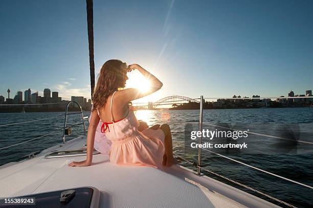 girl looking at the horizon in a sunny day - sydney harbour people stock pictures, royalty-free photos & images
