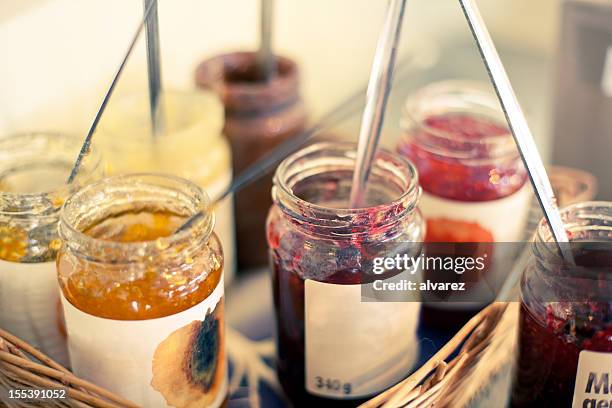 jam jars in a basket - preserves stock pictures, royalty-free photos & images