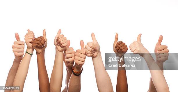 thumbs up hands raised - medium group of people 個照片及圖片檔