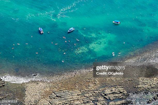 aerial view of boats and people snorkeling - ogphoto and costa rica stock pictures, royalty-free photos & images