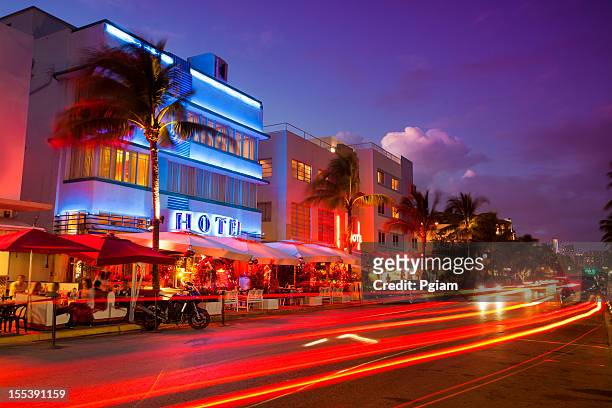 ocean drive by the beach in miami - miami stock pictures, royalty-free photos & images