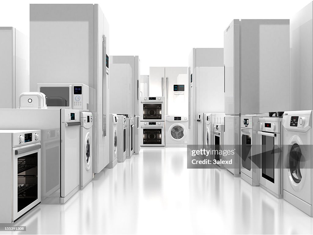Aisle with white appliances on both sides and shiny floor