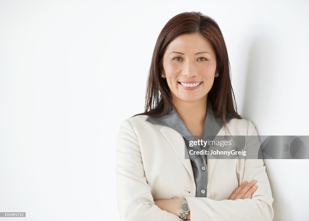 Happy Mature Asian Businesswoman