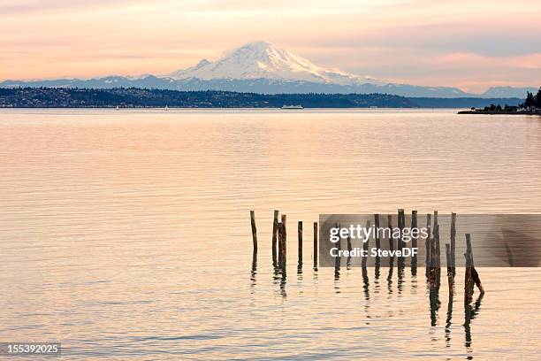 sunset on mount rainier seen over puget sound - washington state ferry stock pictures, royalty-free photos & images