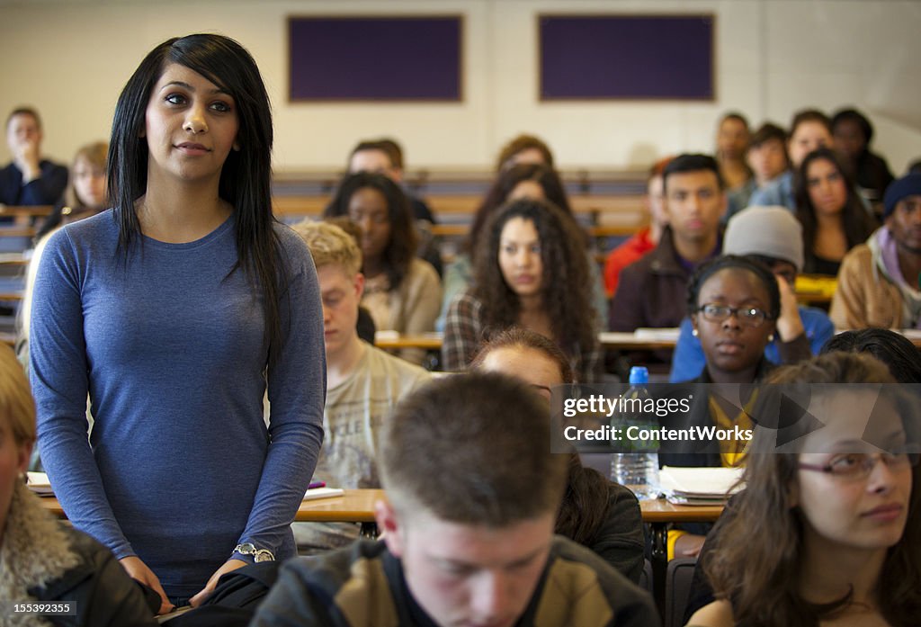 University student standing in lecture room