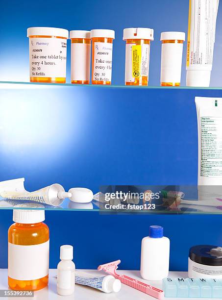 medicine cabinet contents - bathroom cabinet stock pictures, royalty-free photos & images
