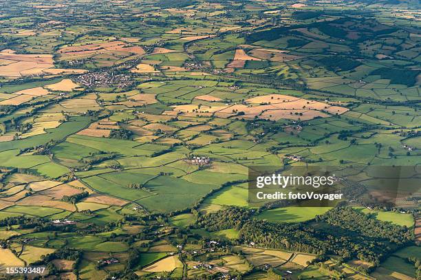 aerial vista over patchwork summer landscape - south wales stock pictures, royalty-free photos & images