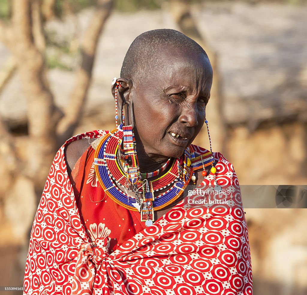 Old maasai woman with impressive earrings.