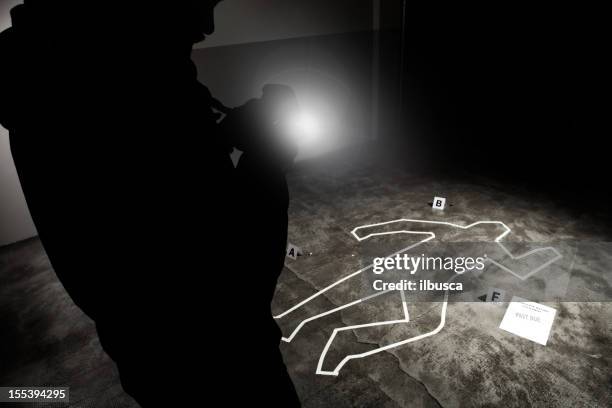 forensic crime scene, photographer in action - body line stockfoto's en -beelden