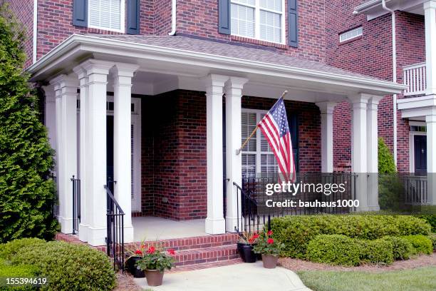 front porch with an american flag - front porch benches stock pictures, royalty-free photos & images