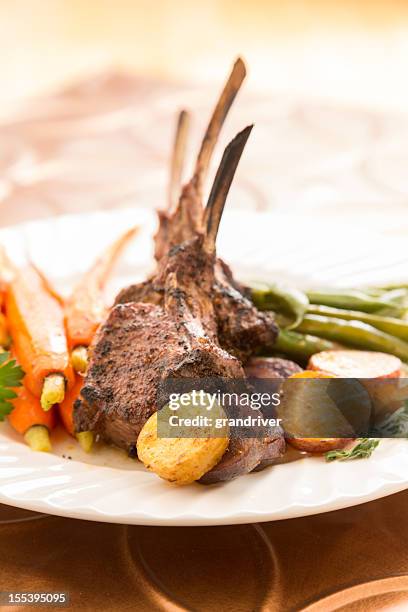 rack of lamb with carrots and green beans - rack of lamb stock pictures, royalty-free photos & images