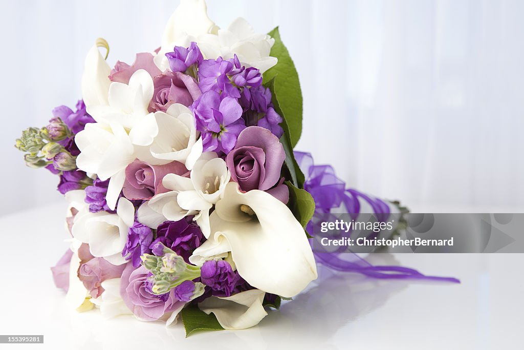 Purple and white bridal bouquet