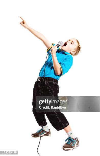 9 year old wannabe rock star giving his all - kid singing stock pictures, royalty-free photos & images