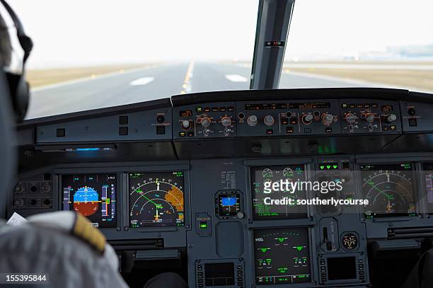 cockpit of airbus a320 on runway ready for take-off - airbus cockpit stock pictures, royalty-free photos & images