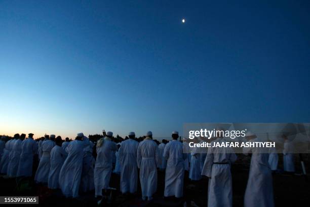 Samaritans pray on top of Mount Gerizim near the northern West Bank city of Nablus during celebrations of the Shavuot festival on May 5, 2010....