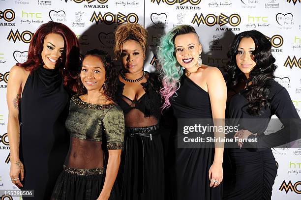 Chilli and T-Boz of TLC pose with Karis Anderson , Courtney Rumbold and Alexandra Buggs of Stoosh attend the 2012 MOBO awards at Echo Arena on...