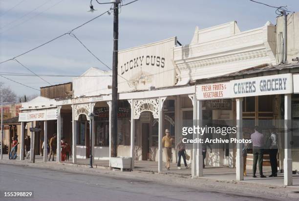 Street in Tombstone, Arizona, boasting the Lucky Cuss and Cokers Grocery, December 1971.
