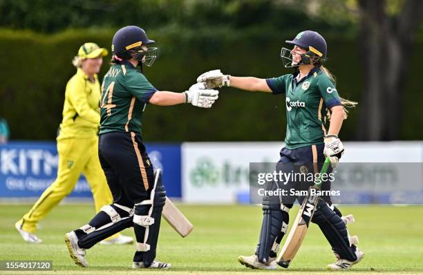 Dublin , Ireland - 25 July 2023; Amy Hunter of Ireland, right, celebrates with team-mate Laura Delany after bringing up her half century during match...